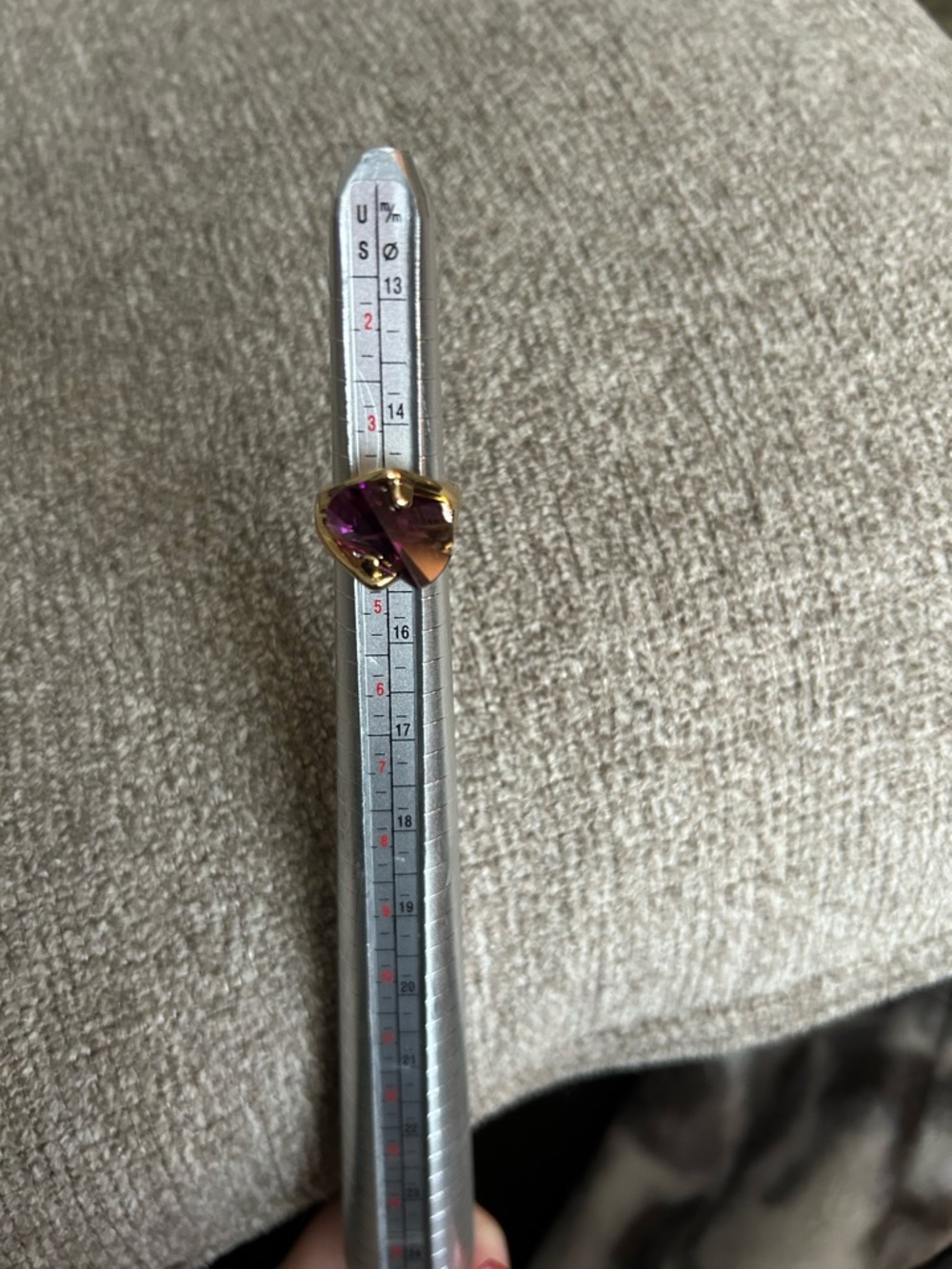Gold-Tone Ring with Purple Faceted Stone
